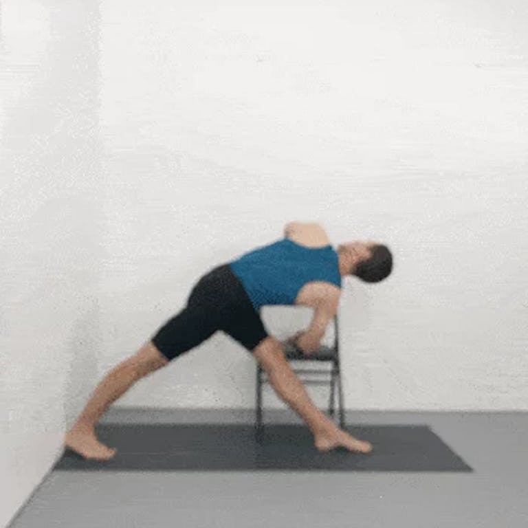 Twisted triangle pose is one of the iyengar yoga poses with chair