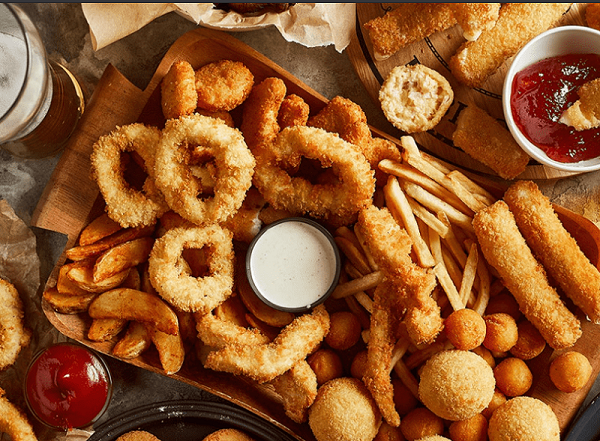Regularly consuming fried foods high in fats can lead to an increase in cholesterol levels in the blood.